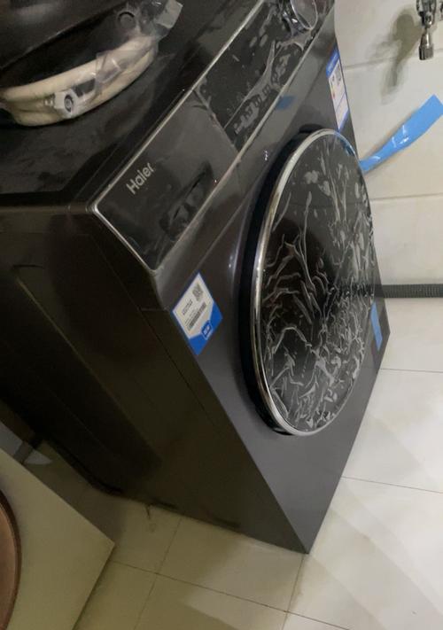 解决海尔洗衣机显示E1故障的方法（轻松应对海尔洗衣机显示E1故障）